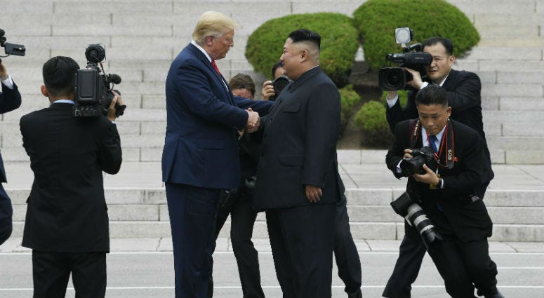 President Donald Trump walks to the North Korean side of the border with North Korean leader Kim Jong Un at the border village of Panmunjom in the Demilitarized Zone, Sunday, June 30, 2019, in North Korea. President Donald Trump walks to the North Korean side of the border with North Korean leader Kim Jong Un at the border village of Panmunjom in the Demilitarized Zone, Sunday, June 30, 2019, in North Korea.