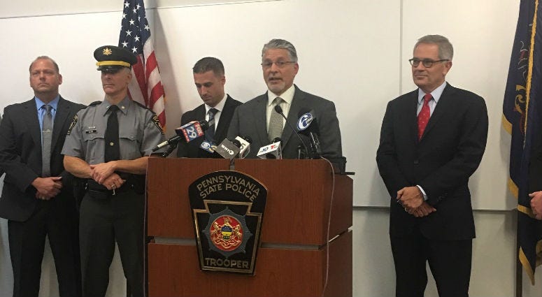 DA Larry Krasner and state police announce the arrest of Theodore Dill Donahue, accused of killing the 27-year-old in Philadelphia. DA Larry Krasner and Pa. State Police at a press conference.