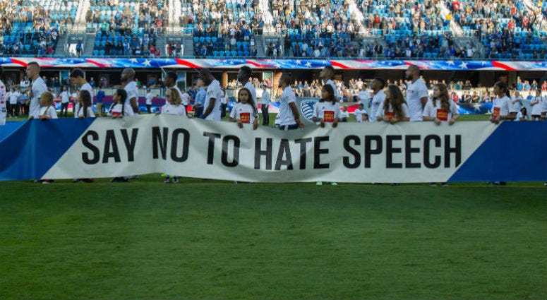 A banner reads "say no to hate speech" before the game between FC Dallas and the San Jose Earthquakes. Hate Speech