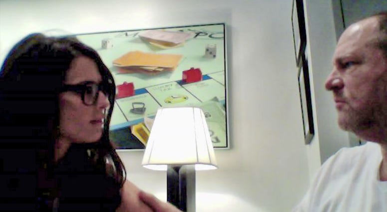 In this image from video made available Wednesday Sept. 12, 2018, Harvey Weinstein caresses the shoulder of Melissa Thompson as they sit side-by-side in front of her laptop computer during what was supposed to be a business presentation in 2011. In this image from video made available Wednesday Sept. 12, 2018, Harvey Weinstein caresses the shoulder of Melissa Thompson as they sit side-by-side in front of her laptop computer during what was supposed to be a business presentation in 2011.