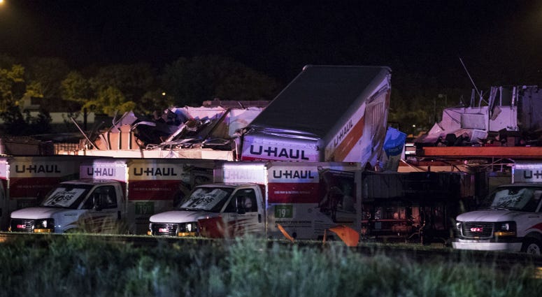 U-Haul trucks parked on Mundy Street in Wilkes-Barre Township, Pa., are damaged after a strong storm moved through the area on Wednesday, June 13, 2018. U-Haul trucks parked on Mundy Street in Wilkes-Barre Township, Pa., are damaged after a strong storm moved through the area on Wednesday, June 13, 2018.