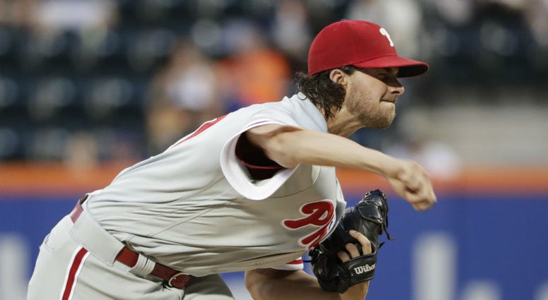Philadelphia Phillies' Aaron Nola delivers a pitch during the first inning in the second game of a baseball doubleheader against the New York Mets Monday, July 9, 2018, in New York. Philadelphia Phillies' Aaron Nola delivers a pitch during the first inning in the second game of a baseball doubleheader against the New York Mets Monday, July 9, 2018, in New York.