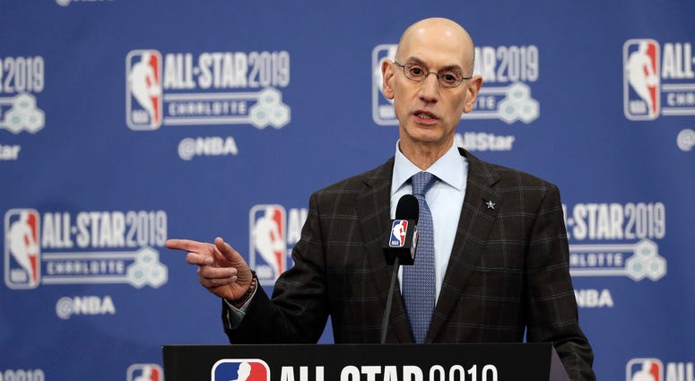 FILE - In this Feb. 16, 2019, file photo, NBA Commissioner Adam Silver speaks during the NBA All-Star festivities in Charlotte, N.C. Silver spoke to the media on Friday, April 12, 2019, in New York after a meeting of the NBA's Board of Governors. He menti FILE - In this Feb. 16, 2019, file photo, NBA Commissioner Adam Silver speaks during the NBA All-Star festivities in Charlotte, N.C. Silver spoke to the media on Friday, April 12, 2019, in New York after a meeting of the NBA's Board of Governors. He menti