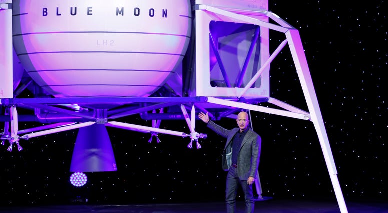 Jeff Bezos speaks in front of a model of Blue Origin's Blue Moon lunar lander, Thursday, May 9, 2019, in Washington. Jeff Bezos speaks in front of a model of Blue Origin's Blue Moon lunar lander, Thursday, May 9, 2019, in Washington.