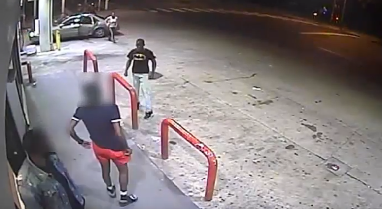Police are on the hunt for four suspects who shattered a woman's car windows with a baseball bat at a gas station while the 33-year-old woman and her 9-year-old daughter were inside. Police are on the hunt for four suspects who shattered a woman's car windows with a baseball bat at a gas station while the 33-year-old woman and her 9-year-old daughter were inside.