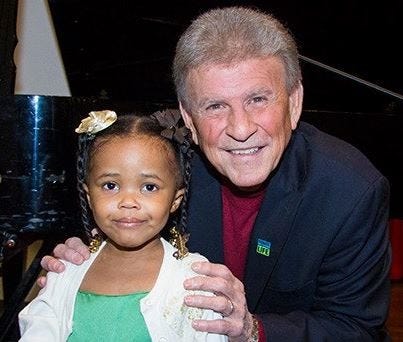 At 4 years old, Assiah received a second liver transplant, sharing the organ with singer Bobby Rydell. Assiah Phinisee and Bobby Rydell
