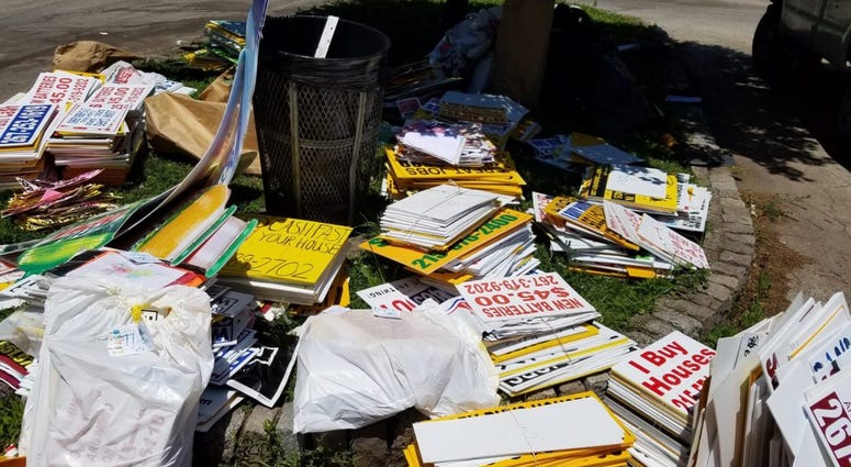 The city's Zero Waste and Litter Cabinet got 24 community groups to join its effort, offering them 50 cents per sign taken down and turned in, up to $250. The city's Zero Waste and Litter Cabinet got 24 community groups to join its effort, offering them 50 cents per sign taken down and turned in, up to $250.