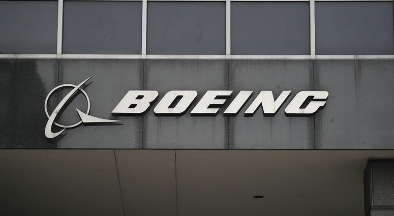 Photo taken on March 13, 2019 shows the Boeing logo at its headquarters in downtown Chicago Photo taken on March 13, 2019 shows the Boeing logo at its headquarters in downtown Chicago