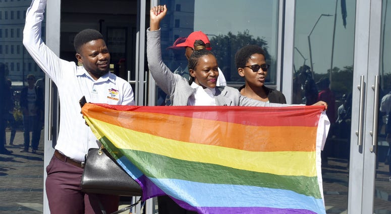 Activists celebrate outside the High Court in Gaborone, Botswana, Tuesday June 11, 2019. Activists celebrate outside the High Court in Gaborone, Botswana, Tuesday June 11, 2019.