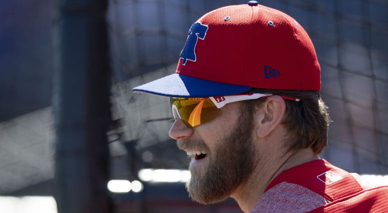 Philadelphia Phillies outfielder Bryce Harper (3) looks on during batting practice before a game between the Phillies and the New York Yankees at Spectrum Field. Philadelphia Phillies outfielder Bryce Harper (3) looks on during batting practice before a game between the Phillies and the New York Yankees at Spectrum Field.