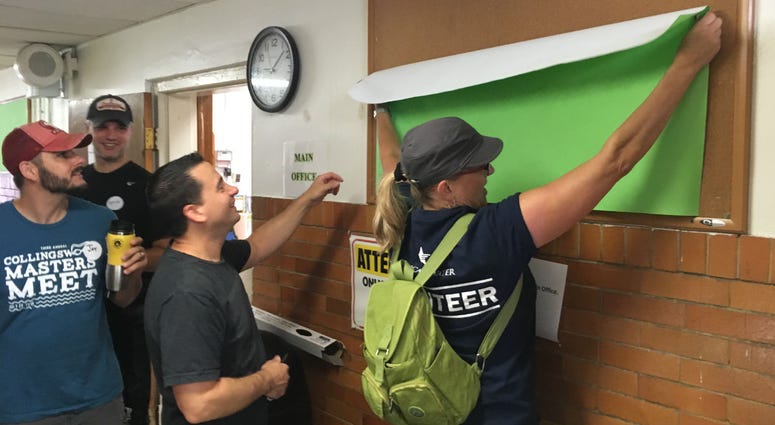 Crews spruce up Camden schools. Crews spruce up Camden schools.