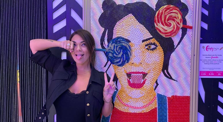 Co-founder Jackie Sorkin stands next to her own candy portrait. Co-founder Jackie Sorkin stands next to her own candy portrait.