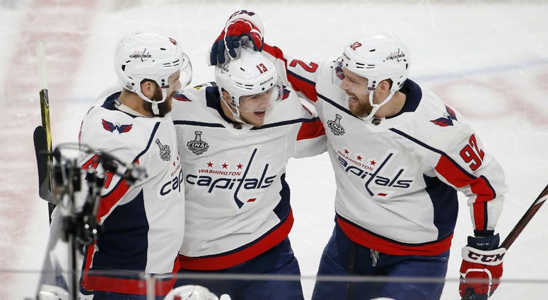 Washington Capitals left wing Jakub Vrana, center, celebrates his goal with right wing Tom Wilson, left, and center Evgeny Kuznetsov during the second period in Game 5 of the NHL hockey Stanley Cup Finals against the Vegas Golden Knights. Washington Capitals left wing Jakub Vrana, center, celebrates his goal with right wing Tom Wilson, left, and center Evgeny Kuznetsov during the second period in Game 5 of the NHL hockey Stanley Cup Finals against the Vegas Golden Knights.
