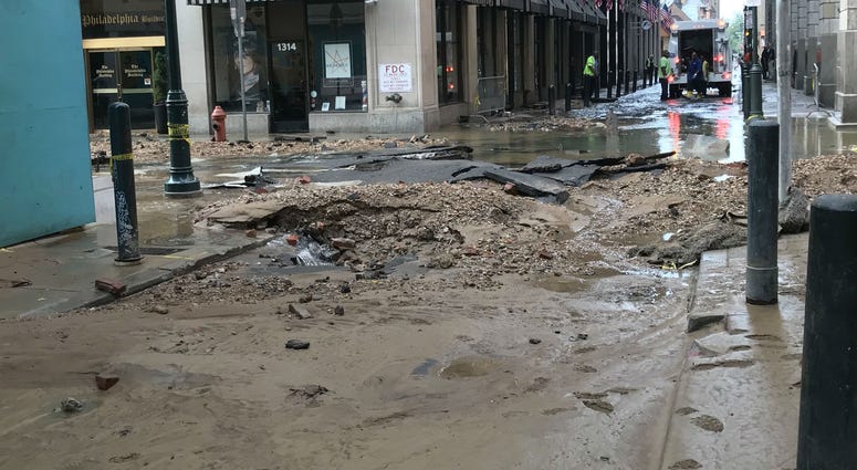 A muddy mess left behind at the site of a water mean break in Center City Philadelphia. A muddy mess left behind at the site of a water mean break in Center City Philadelphia.