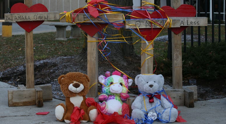 Items are left at a memorial at Mercy Hospital, Tuesday, Nov. 20, 2018, in Chicago, the day after a shooting at the hospital. Items are left at a memorial at Mercy Hospital, Tuesday, Nov. 20, 2018, in Chicago, the day after a shooting at the hospital.