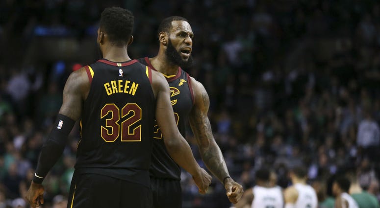 Cleveland Cavaliers forwards LeBron James, right, and Jeff Green celebrate a play during the second half in Game 7 of the NBA basketball Eastern Conference finals against the Boston Celtics, Sunday, May 27, 2018, in Boston. Cleveland Cavaliers forwards LeBron James and Jeff Green
