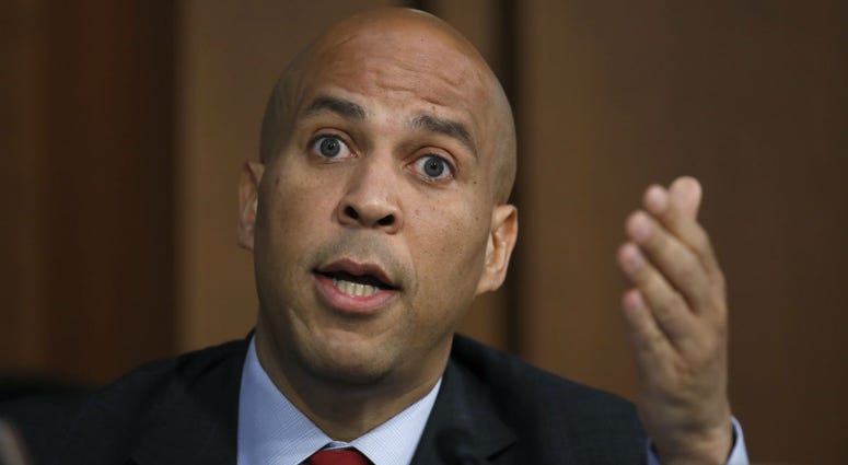 In this Sept. 6, 2018, file photo, Sen. Cory Booker, D-N.J., speaks before President Donald Trump's Supreme Court nominee, Brett Kavanaugh testifies before the Senate Judiciary Committee on Capitol Hill in Washington. In this Sept. 6, 2018, file photo, Sen. Cory Booker, D-N.J., speaks before President Donald Trump's Supreme Court nominee, Brett Kavanaugh testifies before the Senate Judiciary Committee on Capitol Hill in Washington.