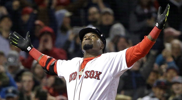 In this April 29, 2016, file photo, Boston Red Sox designated hitter David Ortiz celebrates his two-run home run against the New York Yankees during the eighth inning of a baseball game at Fenway Park, in Boston. In this April 29, 2016, file photo, Boston Red Sox designated hitter David Ortiz celebrates his two-run home run against the New York Yankees during the eighth inning of a baseball game at Fenway Park, in Boston.