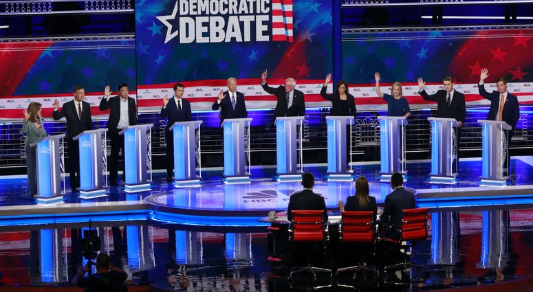 Democratic presidential candidates, Marianne Williamson, John Hickenlooper, Andrew Yang, Pete Buttigieg, Joe Biden, Bernie Sanders, Kamala Harris, Kirsten Gillibrand, Michael Bennet, Eric Swalwell, are shown during a Democratic primary debate. Democratic presidential candidates, Marianne Williamson, John Hickenlooper, Andrew Yang, Pete Buttigieg, Joe Biden, Bernie Sanders, Kamala Harris, Kirsten Gillibrand, Michael Bennet, Eric Swalwell, are shown during a Democratic primary debate.