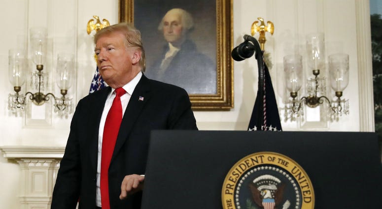 President Donald Trump leaves the podium after speaking about the partial government shutdown, immigration and border security in the Diplomatic Reception Room of the White House, in Washington, Saturday, Jan. 19, 2019. President Donald Trump leaves the podium after speaking about the partial government shutdown, immigration and border security in the Diplomatic Reception Room of the White House, in Washington, Saturday, Jan. 19, 2019.