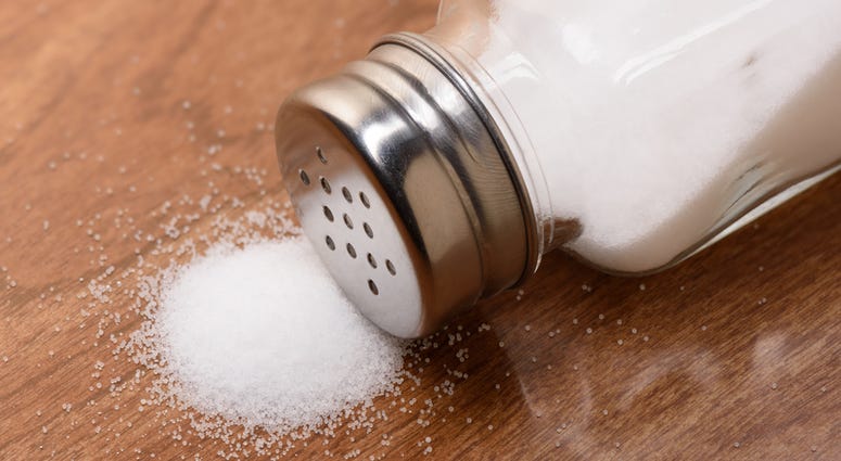 Too much salt can lead to high blood pressure, heart disease and stroke. salt shaker
