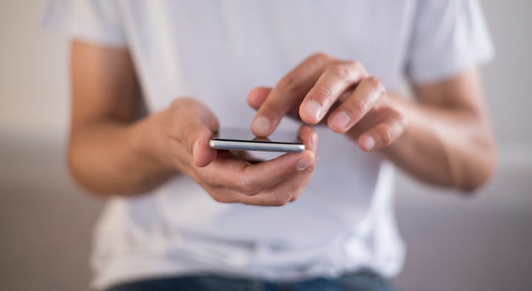 millennial using smart phone millennial using smart phone