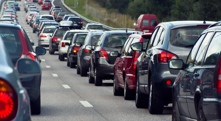 A traffic jam with rows of cars. Holiday Travel