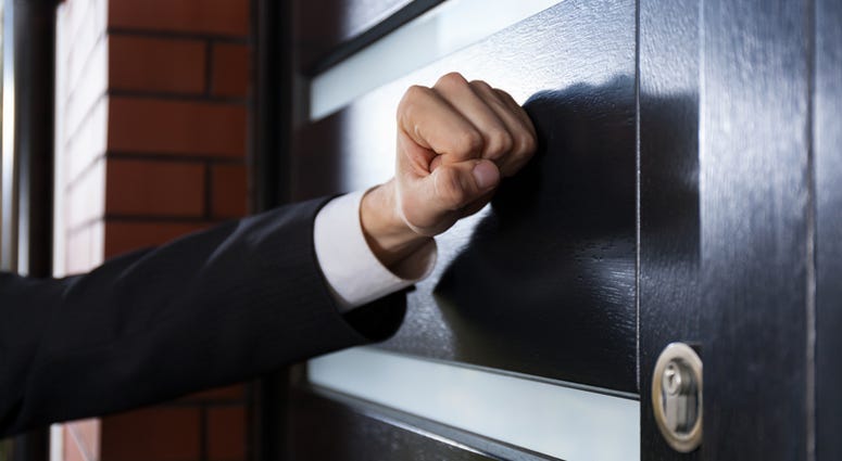 Close-up of hand knocking on the door Knock on Door