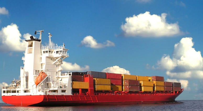 A typical cargo ship put to sea. A typical cargo ship put to sea.