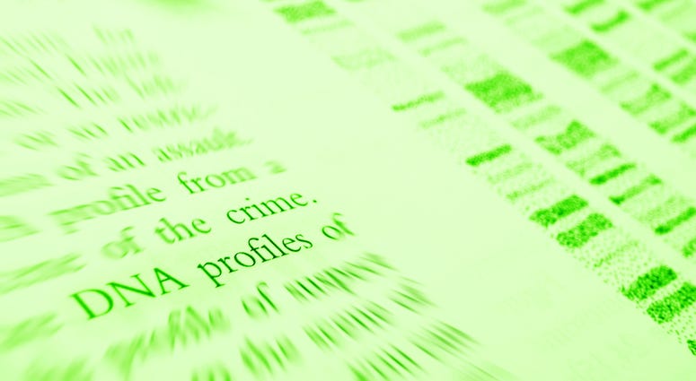 An image showing the studying of DNA profiling, a technique used in forensic criminal sciences, to identify persons under suspect, using their DNA 'finger prints'. Simple composition with copy space. DNA