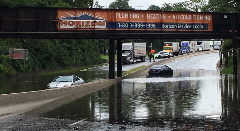Two cars drowned in deep floodwaters on Rt 130 near Maple Ave in Pennsauken Two cars drowned in deep floodwaters on Rt 130 near Maple Ave in Pennsauken