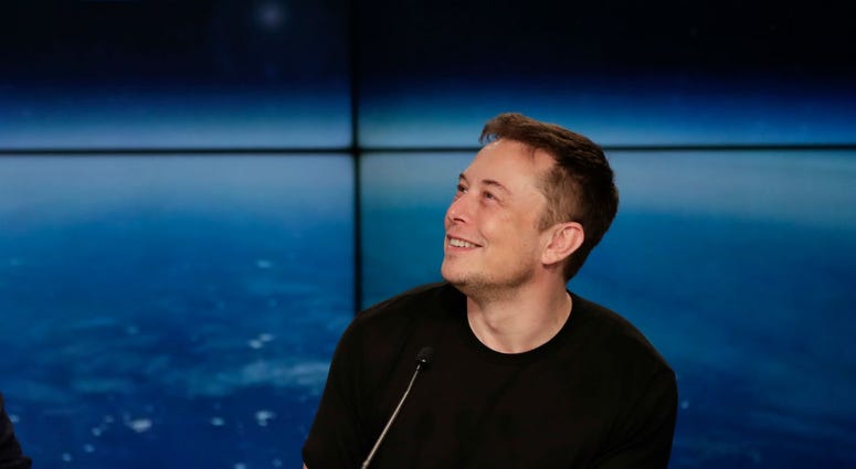 In this Feb. 6, 2018, file photo, Elon Musk, founder, CEO, and lead designer of SpaceX, speaks at a news conference from the Kennedy Space Center in Cape Canaveral, Fla. In this Feb. 6, 2018, file photo, Elon Musk, founder, CEO, and lead designer of SpaceX, speaks at a news conference from the Kennedy Space Center in Cape Canaveral, Fla.