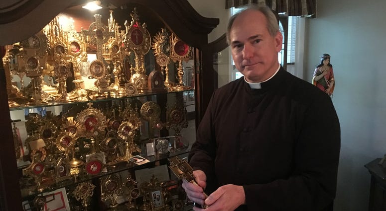 Father Jason Kulczynski, pastor of Holy Martyrs Church in Oreland, Montgomery County, displays some of the relics which are going on public exhibit on Thursday to mark the Roman Catholic All Saints Day. Father Jason Kulczynski, pastor of Holy Martyrs Church in Oreland, Montgomery County, displays some of the relics which are going on public exhibit on Thursday to mark the Roman Catholic All Saints Day.