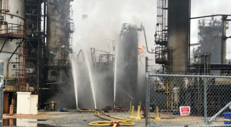 At the scene of an explosion at a Southwest Philadelphia refinery, the resulting fire is contained but not yet under control. At the scene of an explosion at a Southwest Philadelphia refinery, the resulting fire is contained but not yet under control.