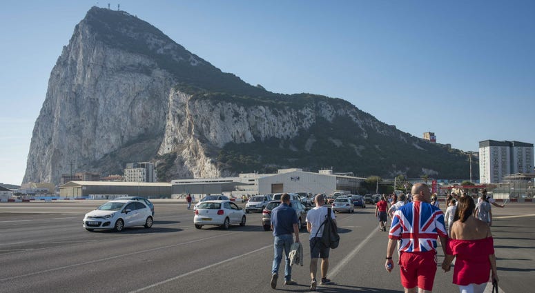 People coming from Spain cross the airport of Gibraltar to take part at the National Day celebrations at the British territory of Gibraltar. People coming from Spain cross the airport of Gibraltar to take part at the National Day celebrations at the British territory of Gibraltar.
