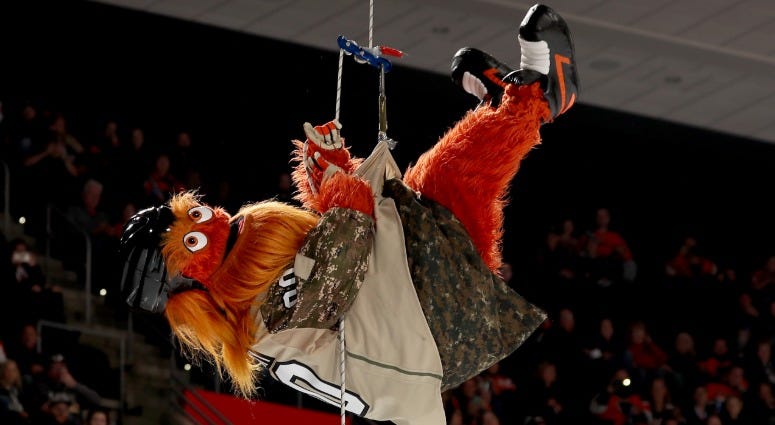 The Philadelphia Flyers mascot Gritty flies down onto the ice before the game between the Philadelphia Flyers and the Chicago Blackhawks at Wells Fargo Center on Nov. 10, 2018 in Philadelphia. Gritty