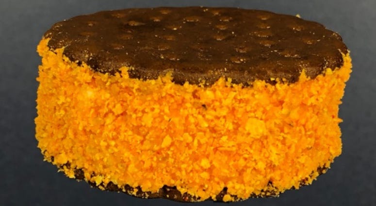 The Gritty Puckster is a Doritos Nacho Cheese-flavored ice cream sandwiched between two chocolate cookies and rolled in crushed Doritos. The Gritty Puckster