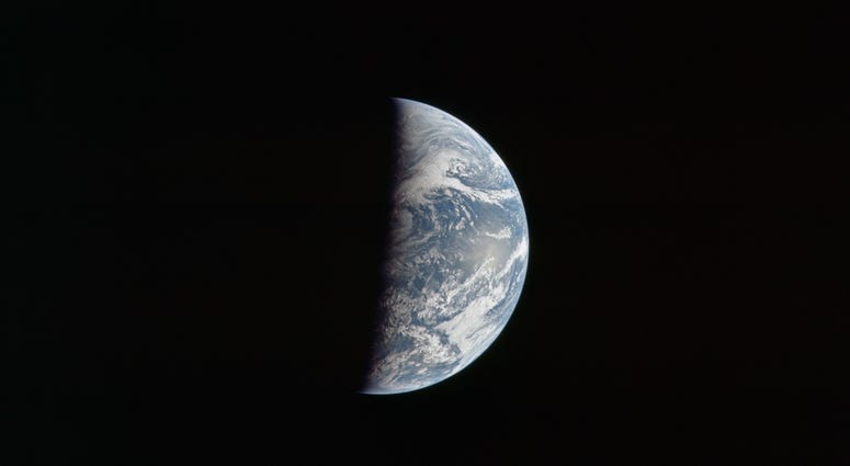Earth at about 162,000 km or 87,500 nautical miles. North is down. The eastern Pacific Ocean dominates the view. Earth at about 162,000 km or 87,500 nautical miles. North is down. The eastern Pacific Ocean dominates the view.