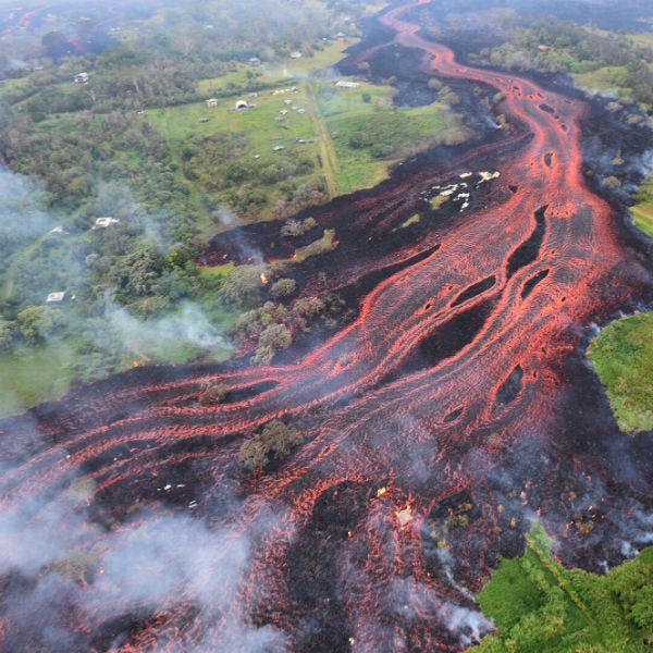In this Saturday, May 19, 2018 file photo, released by the U.S. Geological Survey, lava flows from fissures near Pahoa, Hawaii. In this Saturday, May 19, 2018 file photo, released by the U.S. Geological Survey, lava flows from fissures near Pahoa, Hawaii.