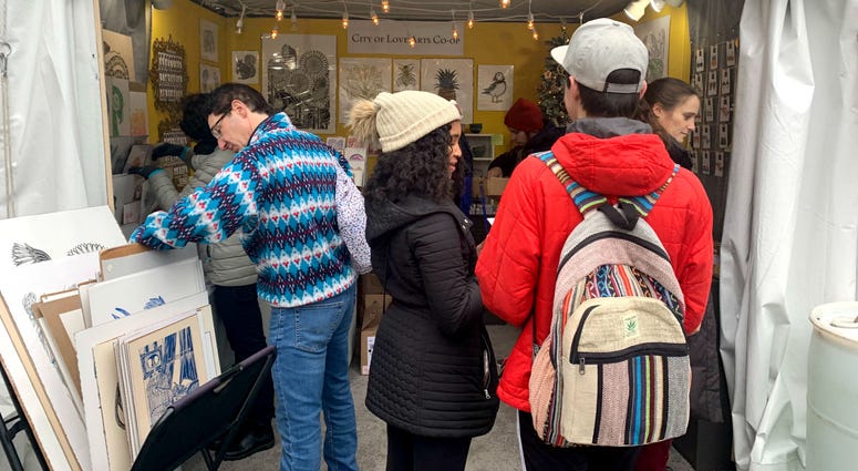 Shoppers at the pop-up holiday markets in Center City. Shoppers at the pop-up holiday markets in Center City.