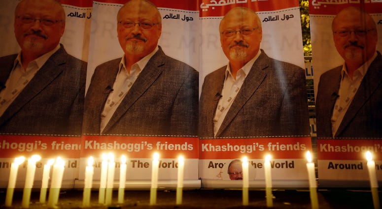 Candles, lit by activists, protesting the killing of Saudi journalist Jamal Khashoggi, are placed outside Saudi Arabia's consulate, in Istanbul, during a candlelight vigil. Candles, lit by activists, protesting the killing of Saudi journalist Jamal Khashoggi, are placed outside Saudi Arabia's consulate, in Istanbul, during a candlelight vigil.
