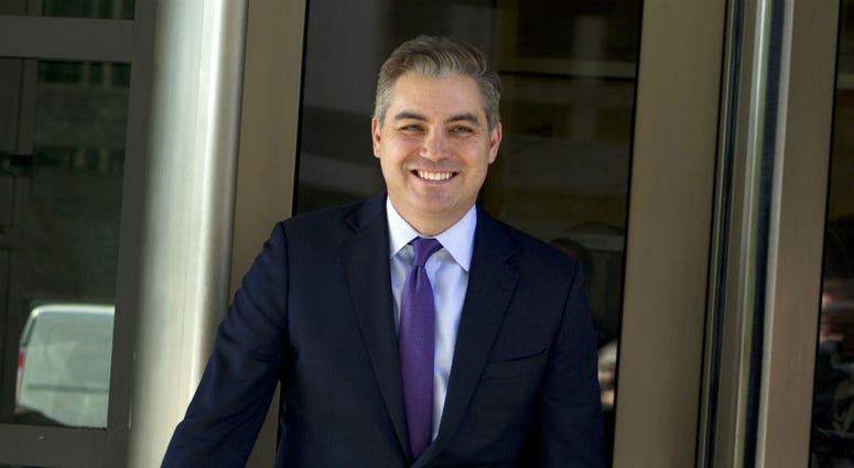 CNN's Jim Acosta walks out of the U.S. District Courthouse with a smile, Friday, Nov. 16, 2018, in Washington. CNN's Jim Acosta walks out of the U.S. District Courthouse with a smile, Friday, Nov. 16, 2018, in Washington.
