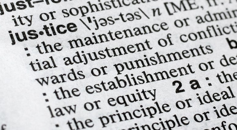In this Dec. 12, 2018, photo, "justice" is displayed in a Merriam-Webster dictionary in New York. Merriam-Webster has chosen "justice" as its 2018 word of the year, driven by the churning news cycle and President Trump's Twitter feed. In this Dec. 12, 2018, photo, "justice" is displayed in a Merriam-Webster dictionary in New York. Merriam-Webster has chosen "justice" as its 2018 word of the year, driven by the churning news cycle and President Trump's Twitter feed.