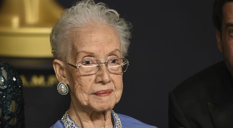In this Feb. 26, 2017, file photo, Katherine Johnson, the inspiration for the film, "Hidden Figures," poses in the press room at the Oscars at the Dolby Theatre in Los Angeles. Katherine Johnson