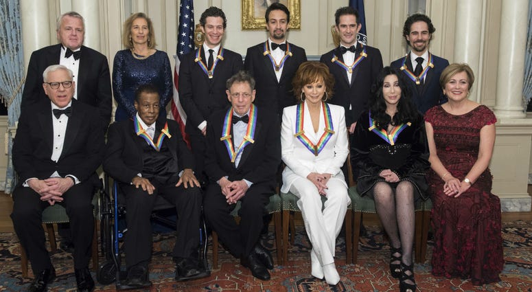 Front row from left: David Rubenstein, Wayne Shorter, Philip Glass, Reba McEntire, Cher, Deborah Rutter; back row from left: Deputy Secretary of State John Sullivan, Grace Rodriguez, Thomas Kail, Lin-Manuel Miranda, Andy Blankenbuehler, and Alex Lacamoire Front row from left: David Rubenstein, Wayne Shorter, Philip Glass, Reba McEntire, Cher, Deborah Rutter; back row from left: Deputy Secretary of State John Sullivan, Grace Rodriguez, Thomas Kail, Lin-Manuel Miranda, Andy Blankenbuehler, and Alex Lacamoire