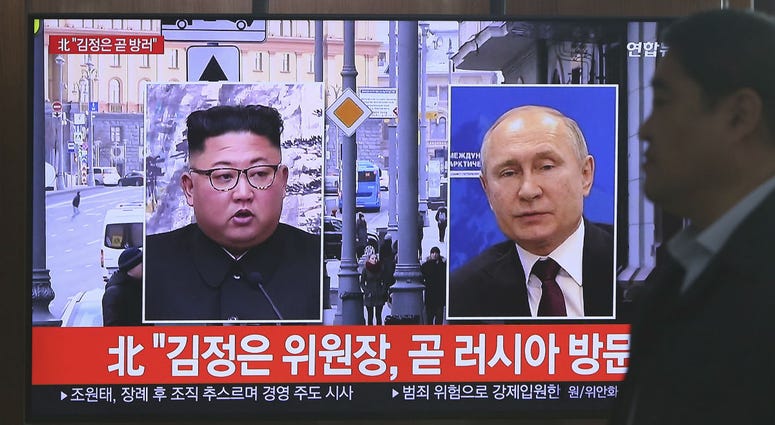 A man passes by a TV screen showing images of North Korean leader Kim Jong Un, left, and Russian President Vladimir Putin, right, during a news program at the Seoul Railway Station in Seoul, South Korea, Tuesday, April 23, 2019. A man passes by a TV screen showing images of North Korean leader Kim Jong Un, left, and Russian President Vladimir Putin, right, during a news program at the Seoul Railway Station in Seoul, South Korea, Tuesday, April 23, 2019.