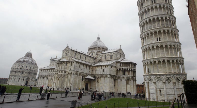The Leaning Tower of Pisa (Torre di Pisa) is seen at right next to the medieval cathedral of Pisa, in Piazza dei Miracoli Square, in Pisa, Italy, Sunday, Jan. 2, 2012. The Leaning Tower of Pisa (Torre di Pisa) is seen at right next to the medieval cathedral of Pisa, in Piazza dei Miracoli Square, in Pisa, Italy, Sunday, Jan. 2, 2012.
