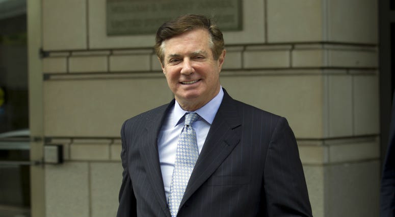 In this May 23, 2018, file photo, Paul Manafort, President Donald Trump's former campaign chairman, leaves the Federal District Court after a hearing, in Washington. In this May 23, 2018, file photo, Paul Manafort, President Donald Trump's former campaign chairman, leaves the Federal District Court after a hearing, in Washington.