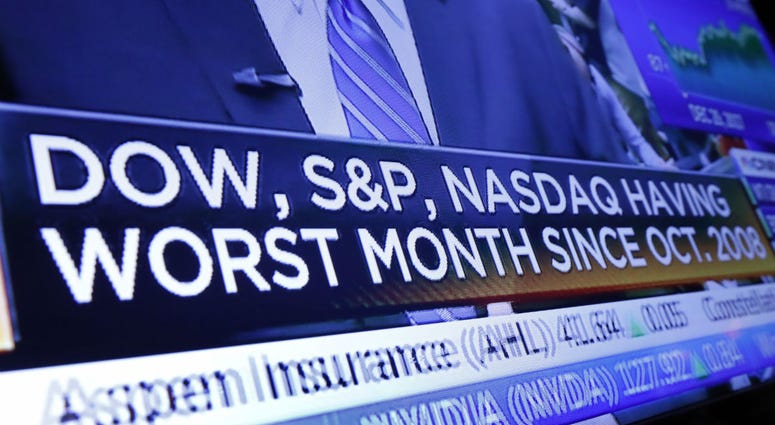 A headline appears on a television screen on the floor of the New York Stock Exchange, Wednesday, Dec. 26, 2018. A headline appears on a television screen on the floor of the New York Stock Exchange, Wednesday, Dec. 26, 2018.