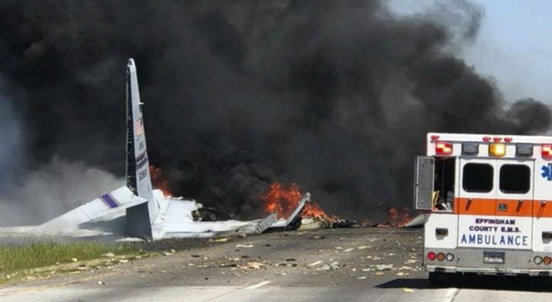 Flames and smoke rise from an Air National Guard C-130 cargo plane after it crashed near Savannah, Ga., Wednesday, May 2, 2018. Flames and smoke rise from an Air National Guard C-130 cargo plane after it crashed near Savannah, Ga., Wednesday, May 2, 2018.
